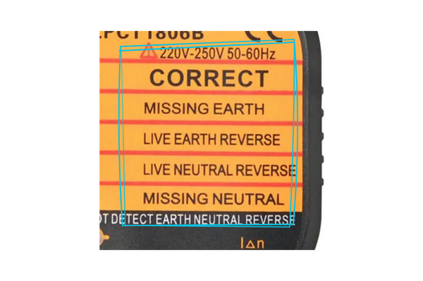 Close-up of the Outlet Grounding Tester's printed wiring guide showing possible results.